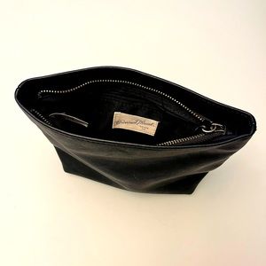 Universal Thread clutch/pouch. Zippered on top with small dividers inside